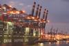 A container ship from China Shipping Line is loaded at the main container port in Hamburg, Germany