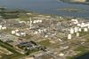 7 August 2017, Moerdijk, Holland. Aerial view of industrial plant Shell Chemicals with river Hollands Diep.