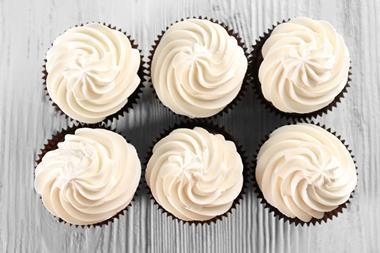 An image showing white cupcake frosting