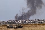 Smoke rises from the area after Israeli army launching an airstrike on the Jabalia Refugee Camp of Gaza City